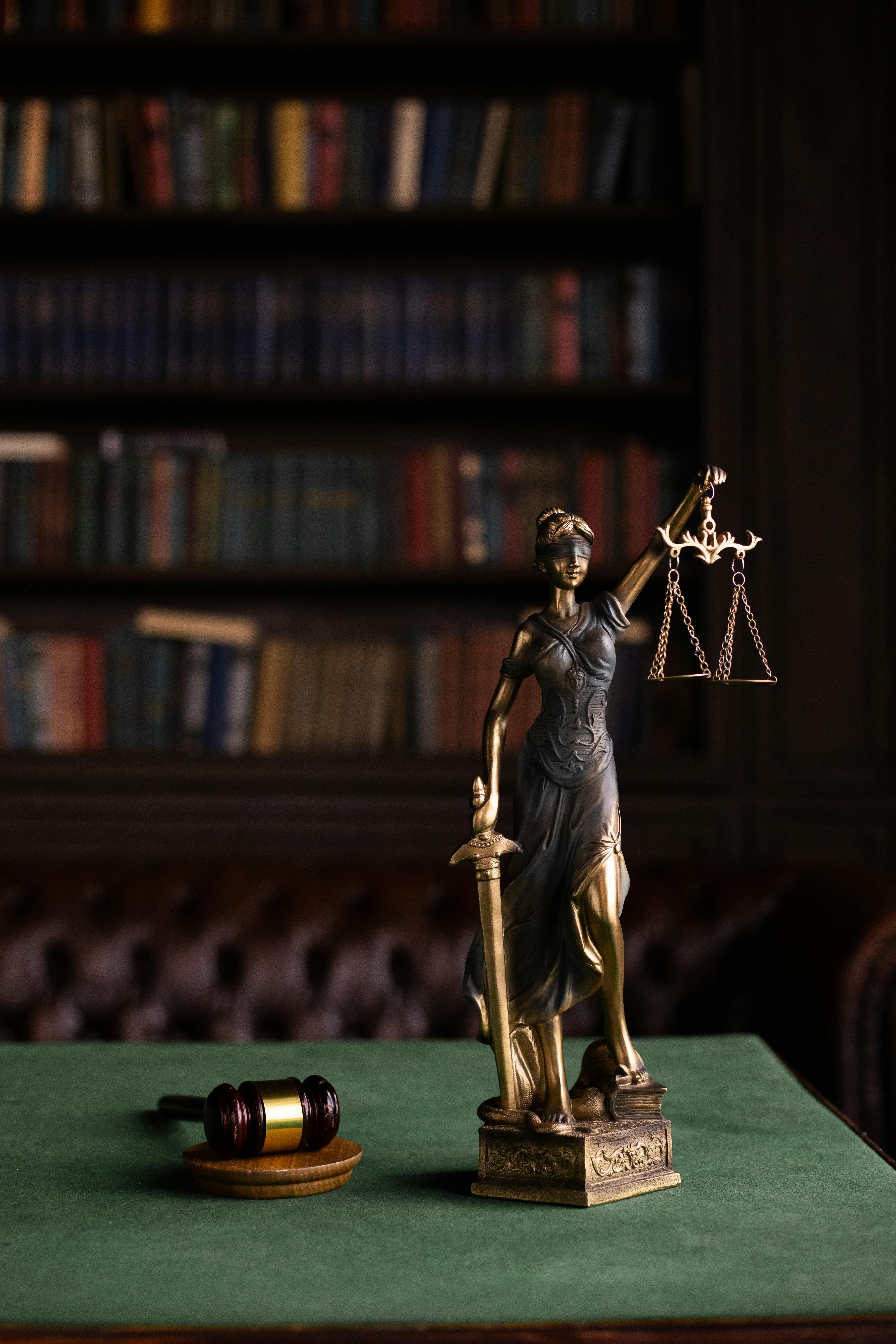 Lady Justice statue with scales and gavel